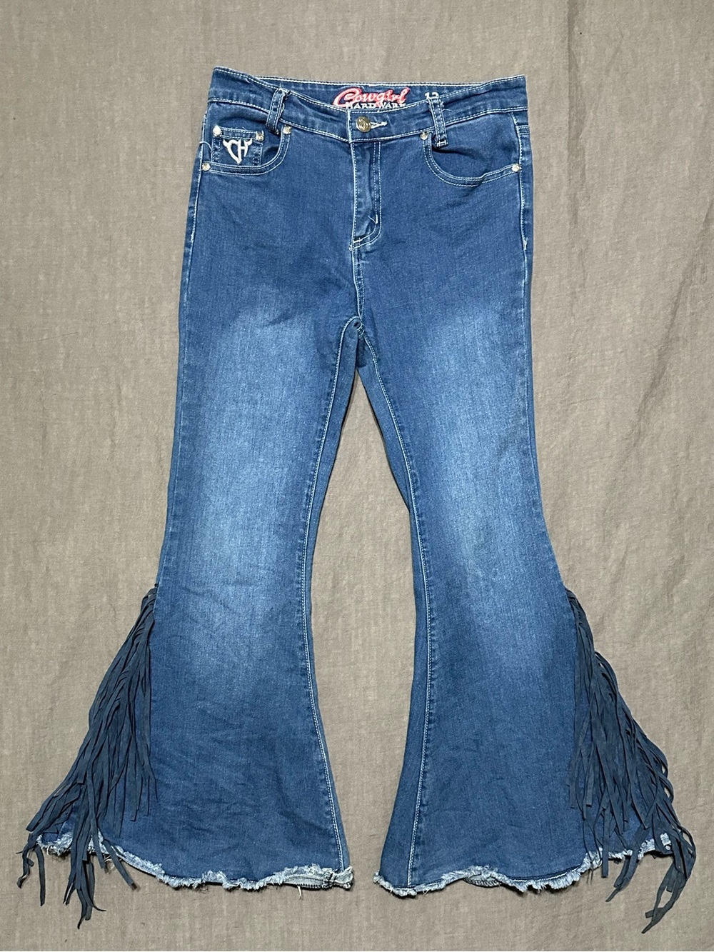 Cowgirl Hardware Blue Fringe Hem Flared Jeans